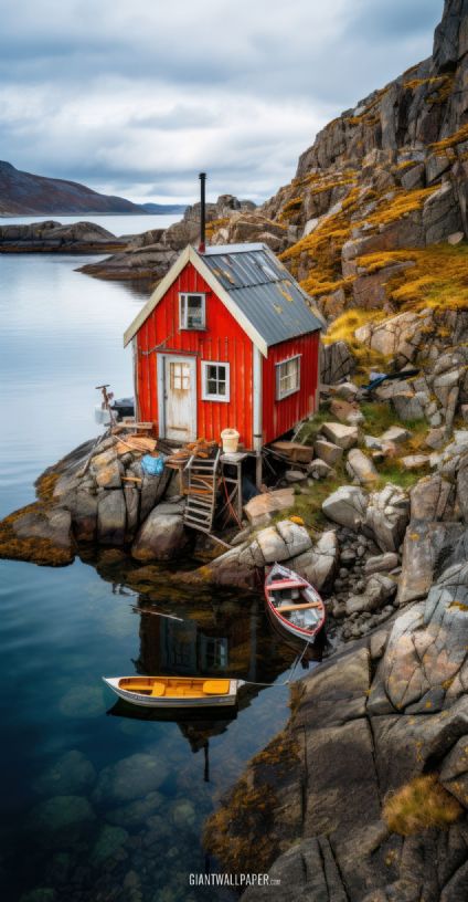 A charming red tiny house nestled in the picturesque Lofoten Islands, offering a cozy travel retreat